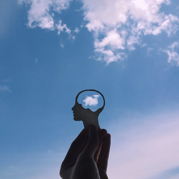 How_Opioids_Affects_Brain An illustration of the human brain with electricity traveling through it.