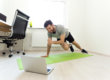 A man in recovery working out at home.