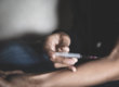 A man injecting heroin into his arm with a syringe.